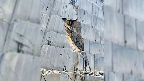 The collapsed granite rock face at a quarry in Bapatla district.