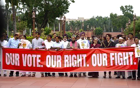 Congress MPs Sonia Gandhi and Priyanka Gandhi Vadra with other parliamentarians of the INDIA bloc parties stage a protest against the Election Commission's Special Intensive Revision (SIR) of electoral rolls in Bihar, during the Monsoon session of Parliament, in New Delhi, Tuesday, Aug. 5, 2025.