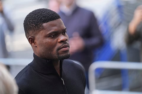 Former Arsenal footballer Thomas Partey arrives at London's Westminster Magistrates' Court where he is charged with five counts of rape and one count of sexual assault, in London, Tuesday, Aug. 5, 2025.