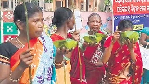 The women staging protest in front of the collector’s office.