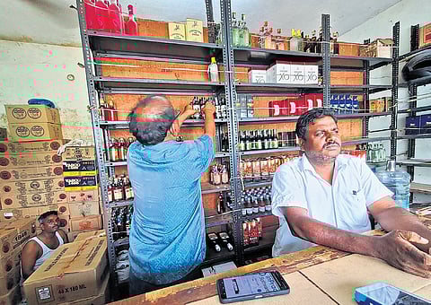Tasmac sales staff at an outlet in Patravakkam in Chennai.