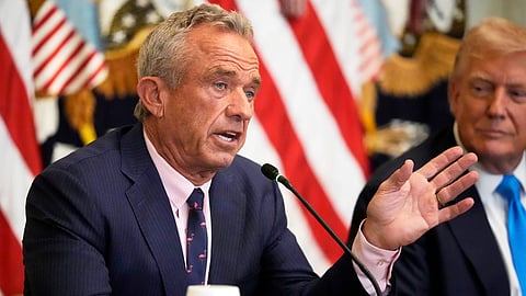 US Health and Human Services Secretary Robert F. Kennedy Jr. speaks as President Donald Trump listens at an event in the East Room of the White House, Wednesday, July 30, 2025, in Washington