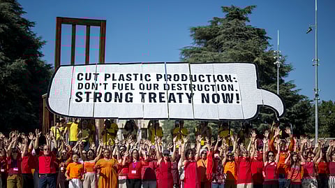 Activists stage a demonstation in front of the United Nations Offices in Geneva on August 4, 2025, on the eve a Plastics Treaty negotiations.