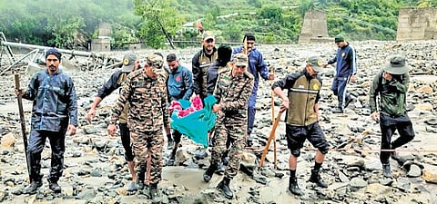 Army personnel conduct search and rescue operation at Dharali village.