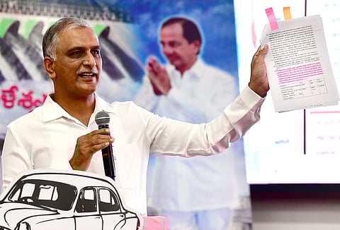 Former minister T Harish Rao makes a point during his PowerPoint presentation on the Kaleshwaram project.