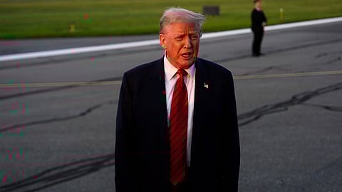 US President Donald Trump speaks with reporters before boarding Air Force One at Lehigh Valley International Airport, Sunday, Aug. 3, 2025, in Allentown, Pa.