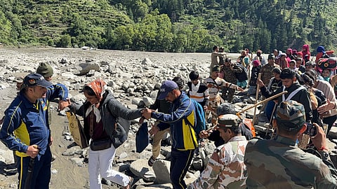 A team of 1,332 personnel from eight departments is engaged in round-the-clock search and rescue operations.