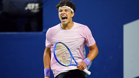 Ben Shelton, of the United States, celebrates after his win over Italy's Flavio Cobolli in their match at the National Bank Open men's tennis tournament in Toronto, Sunday, Aug. 3, 2025.