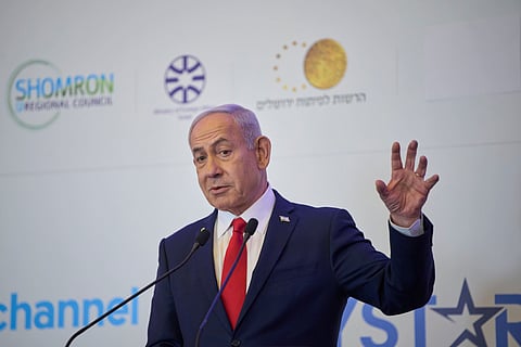 Israeli Prime Minister Benjamin Netanyahu speaks to the audience at a conference in Jerusalem, Sunday, July 27, 2025.