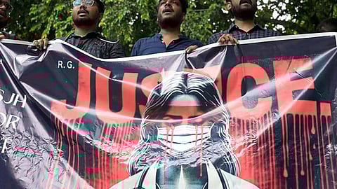 Doctors shout slogans during a protest over their safety in the wake of RG Kar Medical College incident