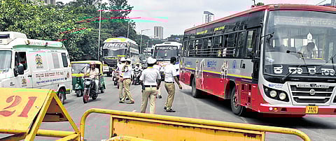 Traffic being diverted by policemen on Anand Rao Circle flyover due to Congress’ protest at Freedom Park on Friday