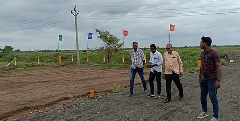A team of Ongole Municipal Corporation town planning wing inspecting the unauthorised layouts and real estate ventures in the OMC limits.