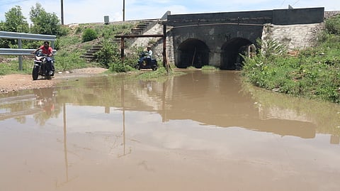 A bridge under the railway track from Ammundi to Sugar Mill in Vellore district is completely waterlogged following heavy rain