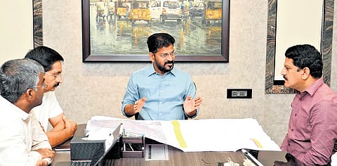 Chief Minister A Revanth Reddy reviews with officials the situation in the aftermath of the heavy rains that lashed Hyderabad, at his residence on Friday