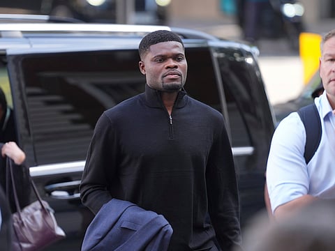 Former Arsenal footballer Thomas Partey arrives at London's Westminster Magistrates' Court where he is charged with five counts of rape and one count of sexual assault, in London, Tuesday, Aug. 5, 2025.