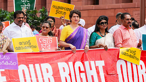 Congress MPs Priyanka Gandhi Vadra and Gaurav Gogoi, JMM MP Mahua Maji, Revolutionary Socialist Party MP N.K. Premachandran and other parliamentarians from the INDIA bloc parties at a protest against the Election Commission's Special Intensive Revision (SIR) of electoral rolls in Bihar, during the Monsoon session of Parliament, in New Delhi, Friday, Aug. 8, 2025.