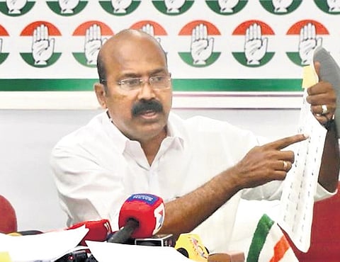 Thrissur DCC president Joseph Tajet shows the voters’ list to reporters