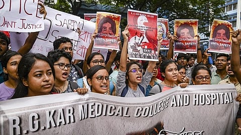 Junior doctors protest against the rape and killing of a trainee doctor, at RG Kar Medical College and Hospital in Kolkata.