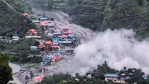 Houses being swept away in a flash flood triggered by a cloudburst at Dharali, in Uttarkashi district, Uttarakhand, Tuesday, Aug. 5, 2025.