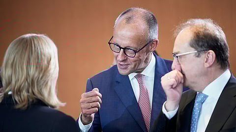 German Chancellor Friedrich Merz, center, attends a cabinet meeting at the chancellery in Berlin, Germany, Wednesday, July 30, 2025.
