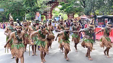 Tribal communities showcase cultural performances during a rally from Palayam to Kanakakunnu in Thiruvananthapuram on Saturday, marking the ST Development Departments golden jubilee celebrations.