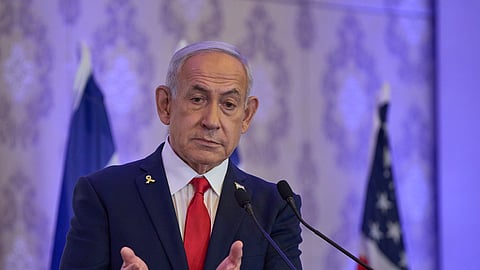 Israeli Prime Minister Benjamin Netanyahu speaks to the audience at a conference in Jerusalem, Sunday, July 27, 2025.