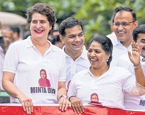 Congress MPs during a protest by INDIA bloc over SIR in New Delhi on Tuesday.