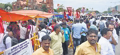 Sanitary workers continue their protest under makeshift tents outside the Ripon Buildings