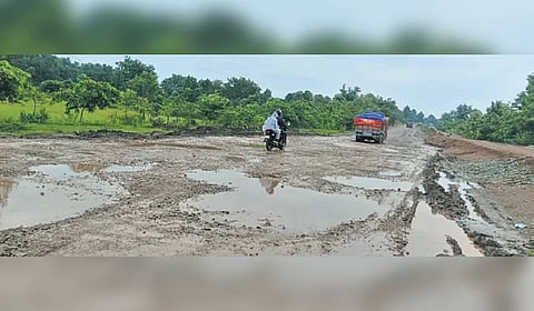 The dilapidated condition of NH-49 stretch at Dwarsuni Ghat in Bangiriposi.