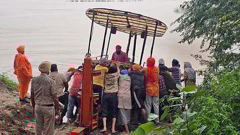 Villagers have loaded the trucks and tempos to shift their belongings to safer places.