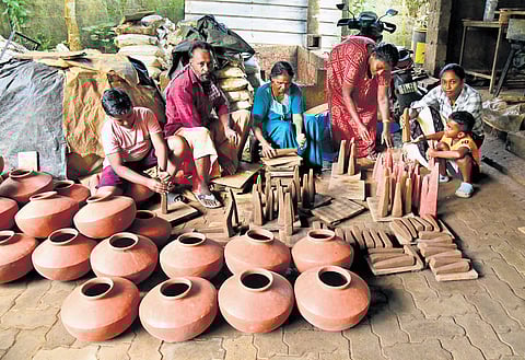 Thoppil Unni and his family engaged in crafting Onathappan ahead of the upcoming Onam festival.