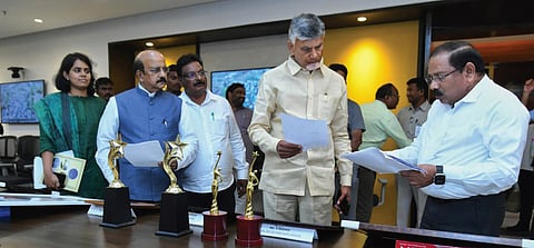 Chief Minister Nara Chandrababu Naidu reviews the Energy Portfolio Management System during a meeting on Thursday.
