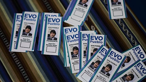 Stickers of former President Evo Morales sit on a table at a campaign centre for supporters in favour of a null vote in the upcoming presidential elections in El Alto, Bolivia, Tuesday, Aug. 12, 2025.