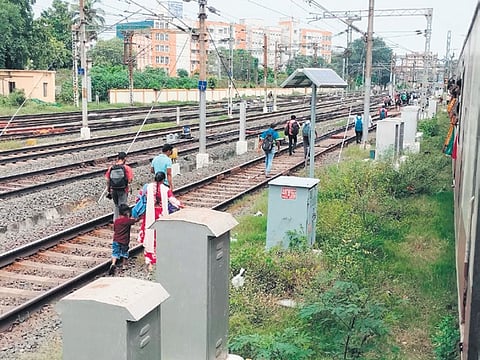 The suburban train was halted between Basin Bridge and Chennai Central.