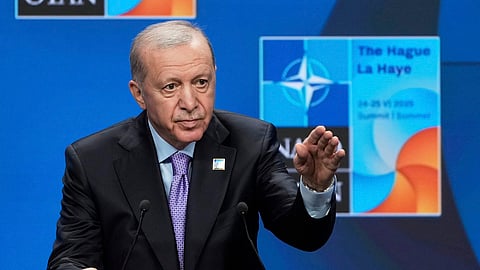 Turkish President Recep Tayyip Erdogan gestures during a press conference after the plenary session at the NATO summit in The Hague, Netherlands, on June 25, 2025.