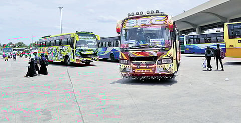 Private buses hired by TNSTC Villupuram being operated from KCBT to Tiruvannamalai (down) while commuters are seen occupying the platforms on Friday