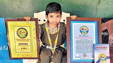 Aaradhya Behra, a Class 1 student from Mandal Parishad Primary School, Bapadapalem, Paravada Mandal, Anakapalli District, Andhra Pradesh, recognised by the International Wonder Book of Records for her alphabet memory achievement.