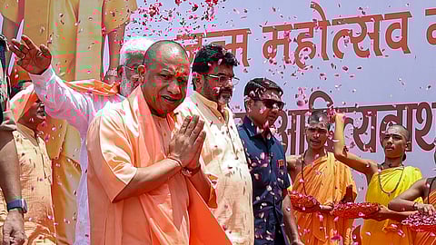 Yogi Adityanath at Krishna Janmasthan Temple on the occasion of Janmashtami festival, in Mathura, Saturday.