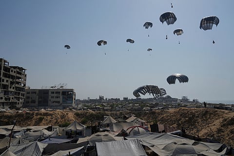 Humanitarian aid is airdropped to Palestinians over Gaza City, northern Gaza Strip, Thursday, Aug. 14, 2025.