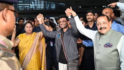 Shukla with Union Minister Jitendra Singh and Delhi Chief Minister Rekha Gupta.