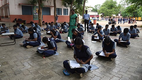 Students writing slip test at Syed Murtuza Higher Secondary school