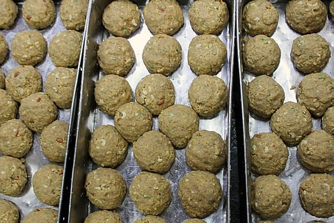 The iconic Tirumala Laddu, a sacred offering to Lord Venkateswara and a symbol of divine grace at the Tirumala Tirupati Devasthanams (TTD.