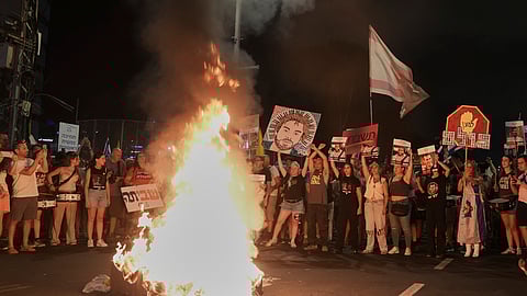 People take part in a protest demanding the end of the war, the immediate release of hostages held by Hamas in the Gaza Strip, and against Prime Minister Benjamin Netanyahu's government in Tel Aviv, Israel, Saturday, Aug. 16, 2025