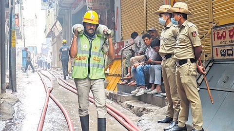 The fire broke out in a building located on Rajanna Lane, Nagarathpet, around 3am Saturday.