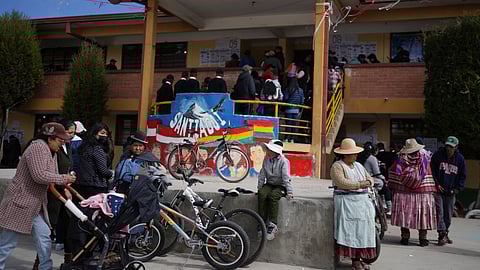 Voters line up at a polling post during general elections in El Alto, Bolivia, Sunday, Aug. 17, 2025.