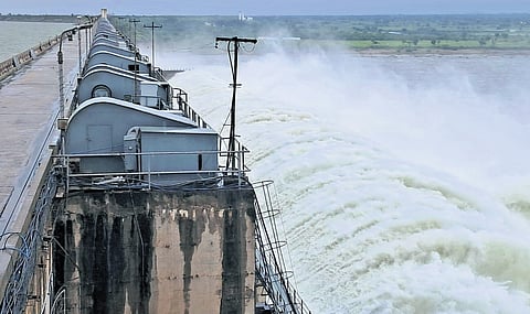 Water gushes from the gates of the Sriramsagar Project on Monday