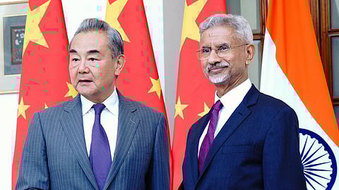 External Affairs Minister S. Jaishankar welcomes Chinese Foreign Minister Wang Yi, in New Delhi on Monday.