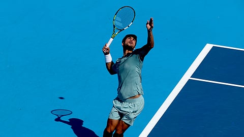 Carlos Alcaraz of Spain serves to Jannik Sinner of Italy during the men's final of the Cincinnati Open at Lindner Family Tennis Center on August 18, 2025 in Mason, Ohio.