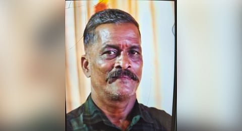 58-year-old Unnikrishnan died after falling off a tree at Pathalam in Eloor on Monday.