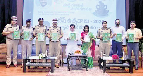 Minister Ponnam Prabhakar, along with senior officials, unveils the ‘Ganesh Immersion Action Plan’ guide in Hyderabad on Tuesday